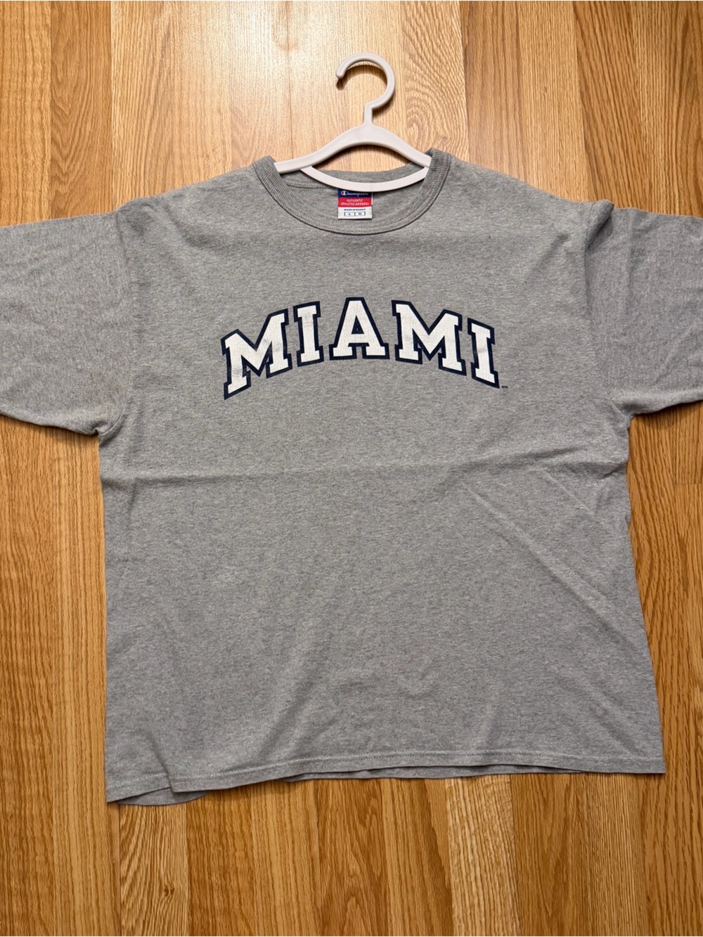 Miami Champion Gray T-Shirt
 with Red & Blue Tag